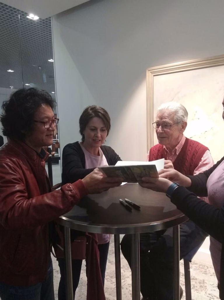 Dr Edward with Dr Brian Weiss in a indoor environment